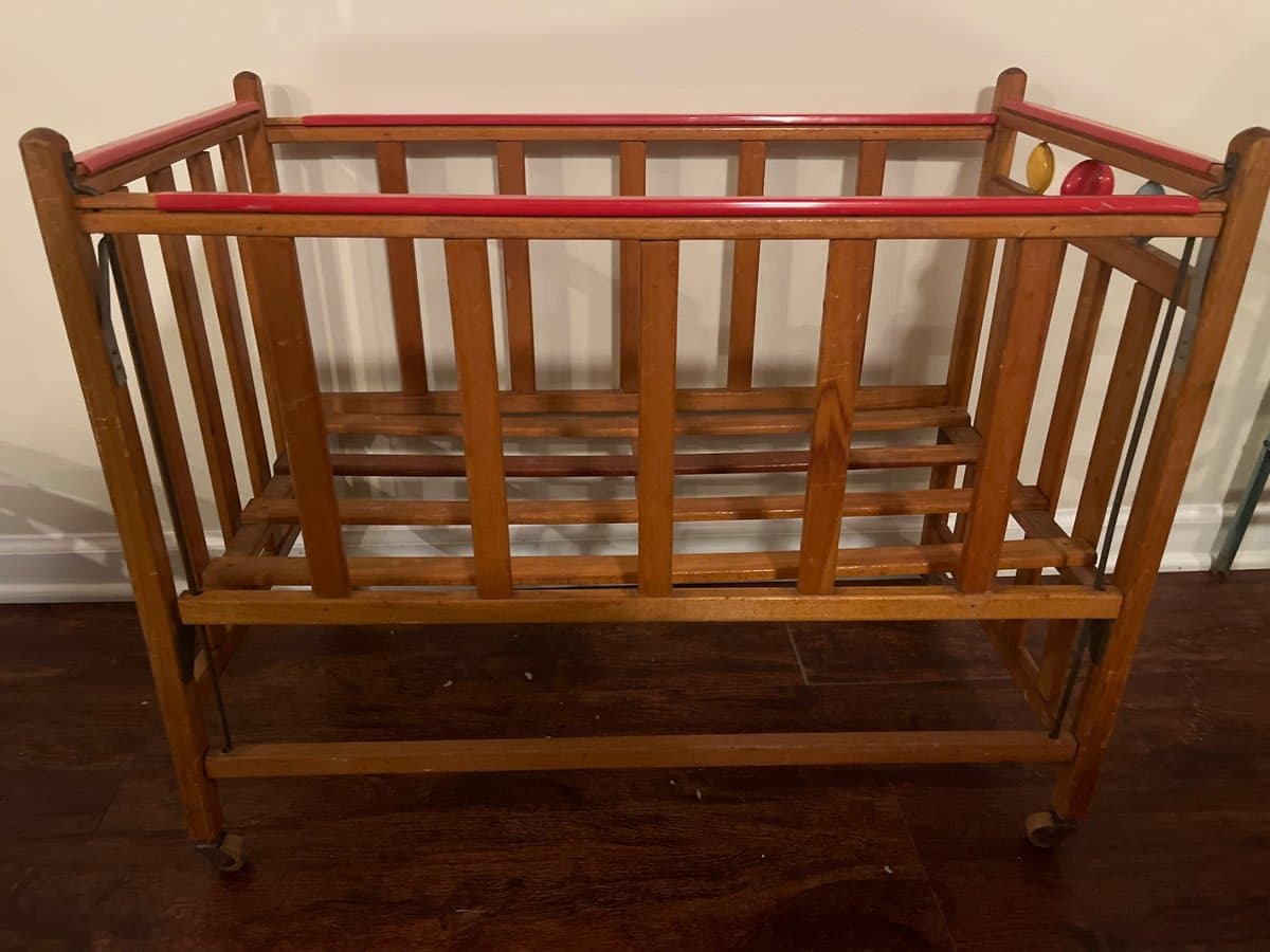 Vintage Wooden Baby Crib with Red Rail & Beads - photo 1