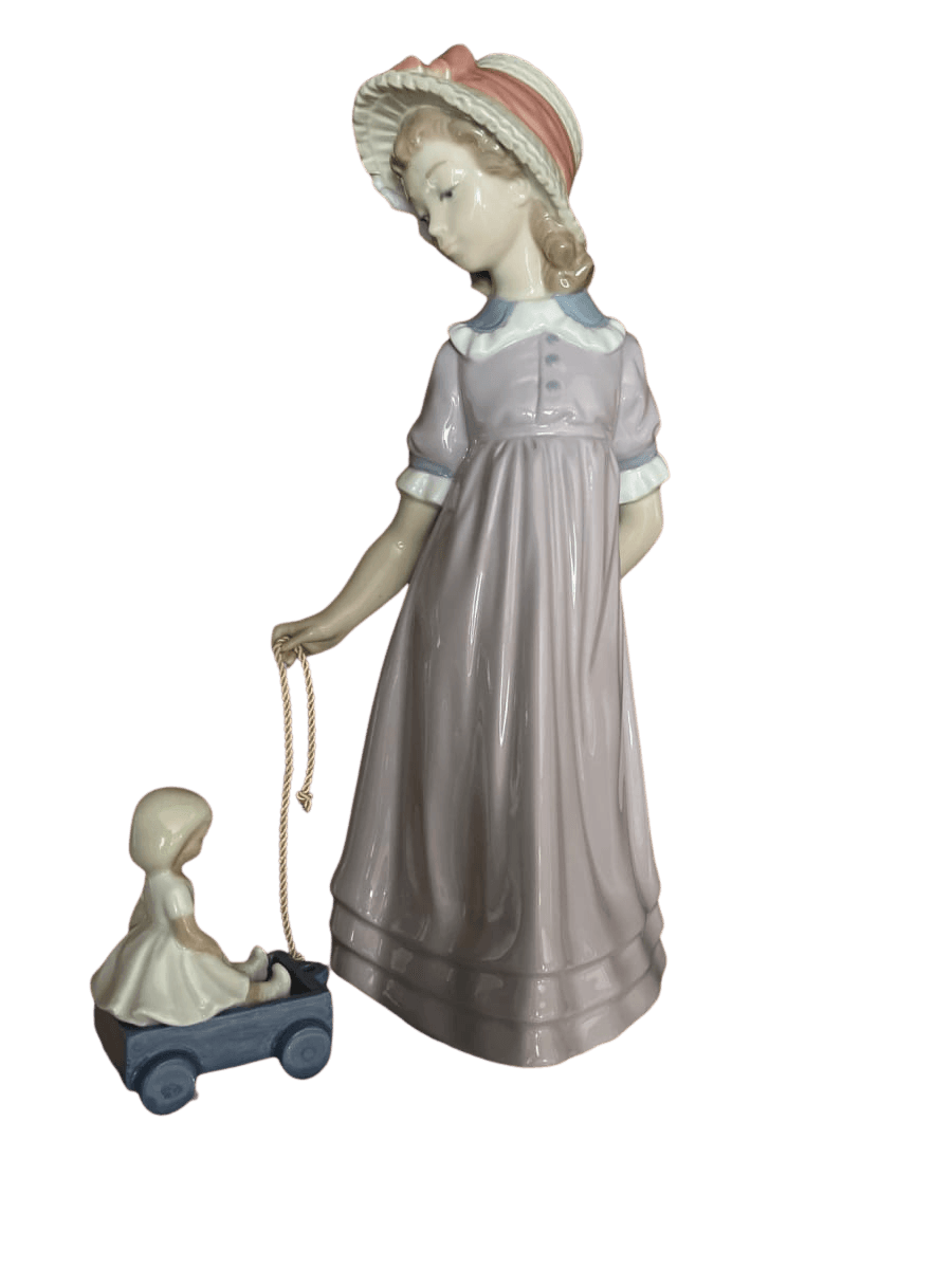 Lladró Girl Pulling Baby in Wagon Figurine - photo 1