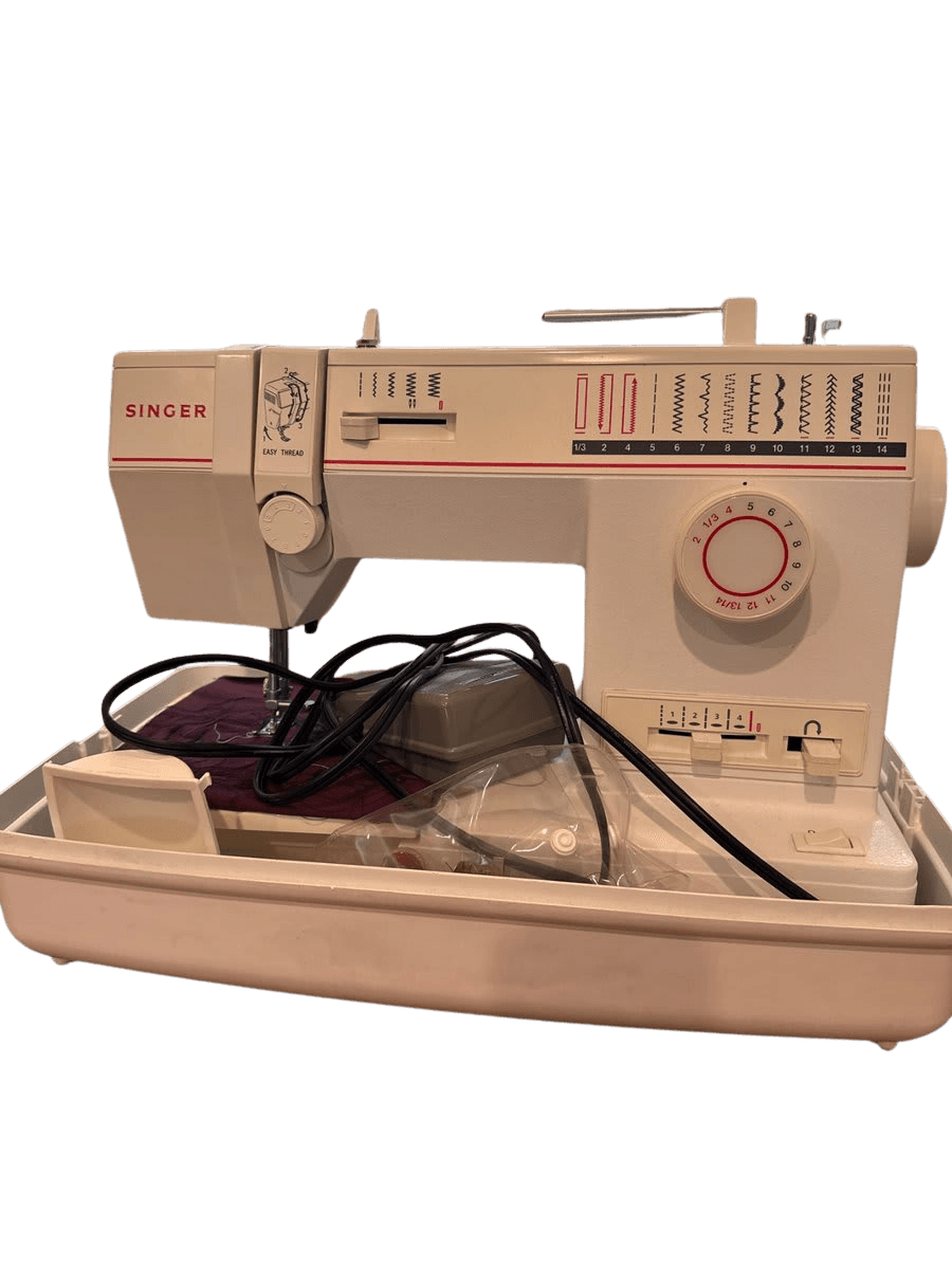 Singer Electric Sewing Machine with Accessories - photo 1